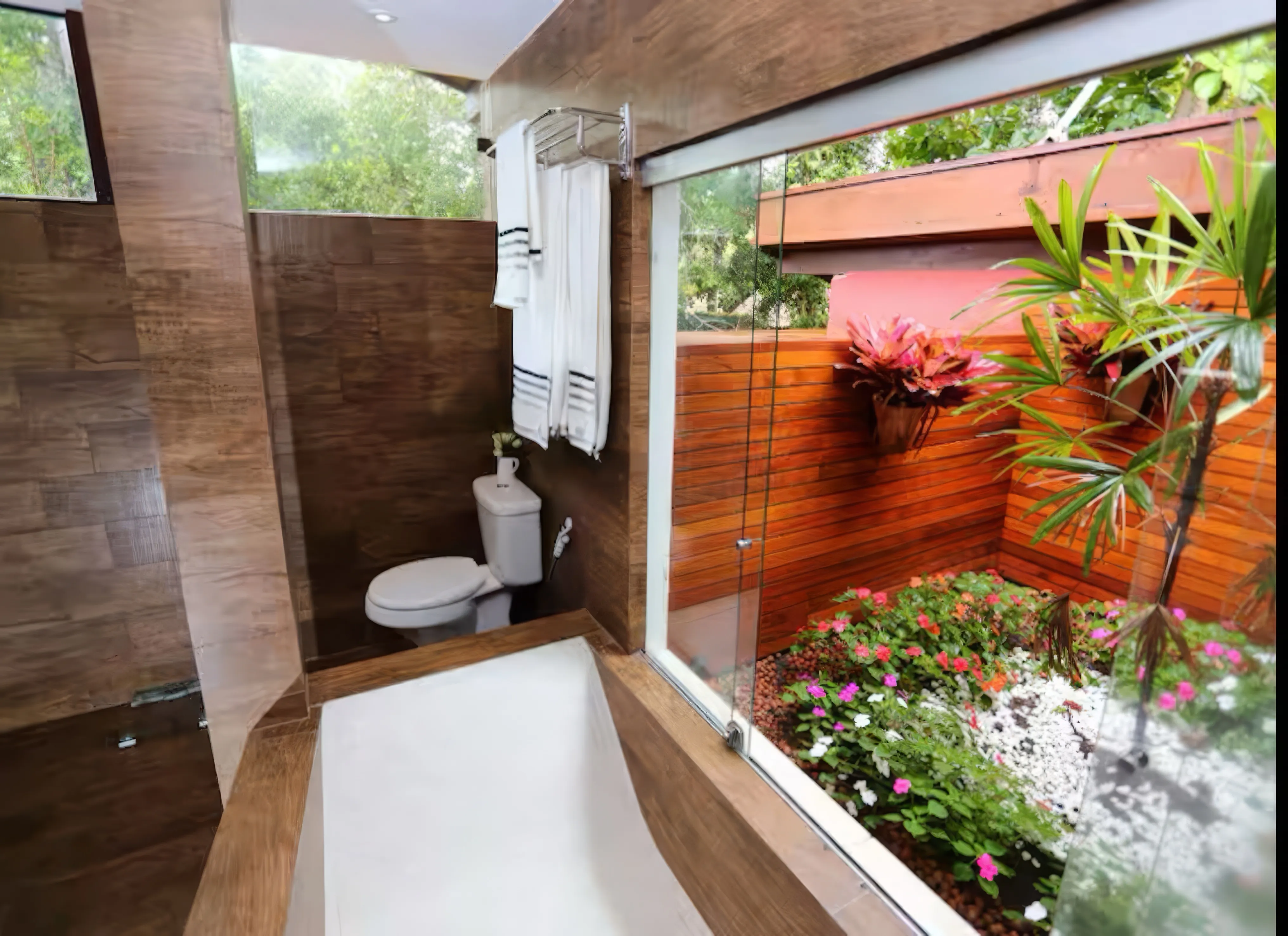 Banheiro da suíte master com banheira de imersão, pia dupla e acabamentos de luxo.